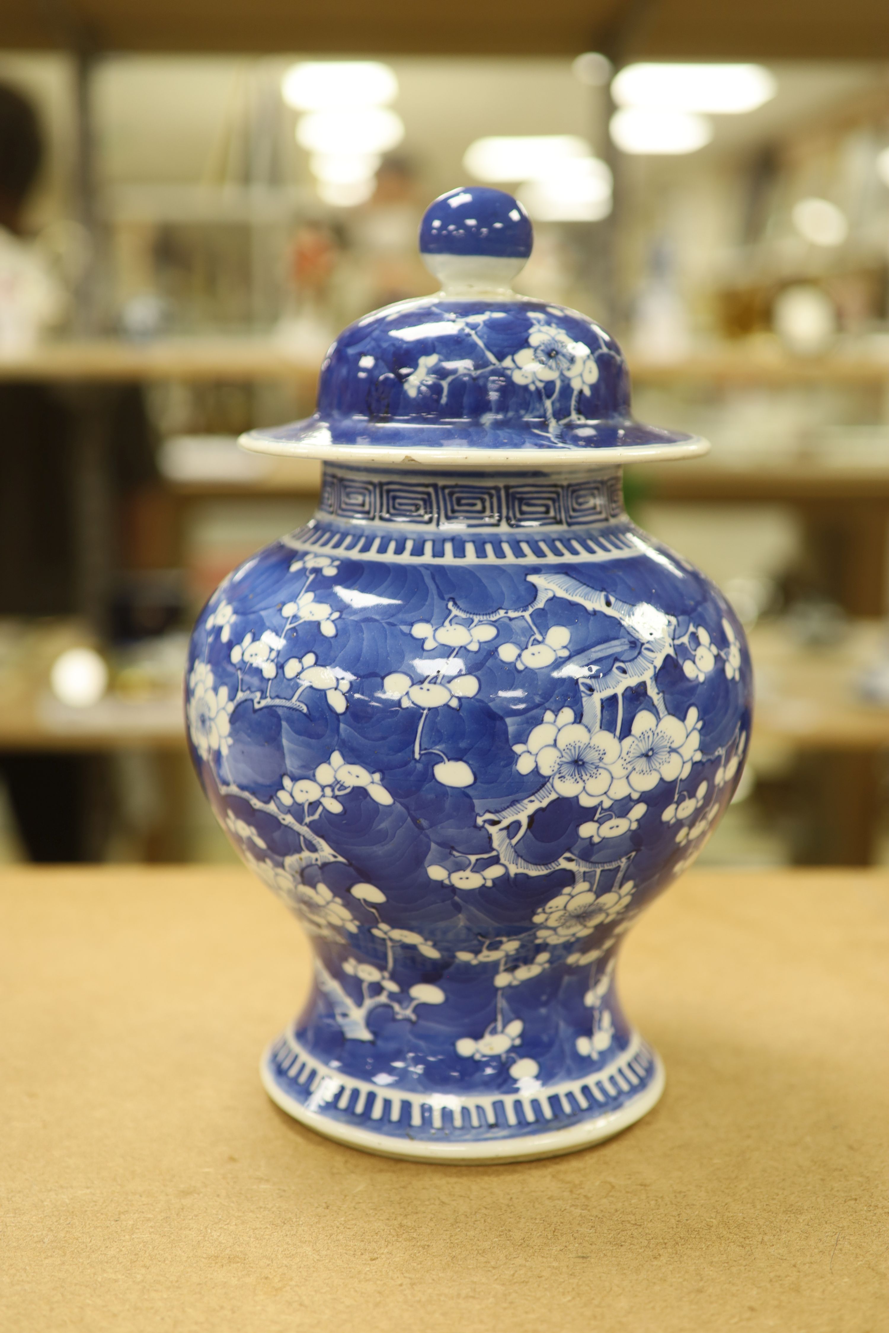 A 19th century Chinese blue and white prunus jar and cover, height, 33cm